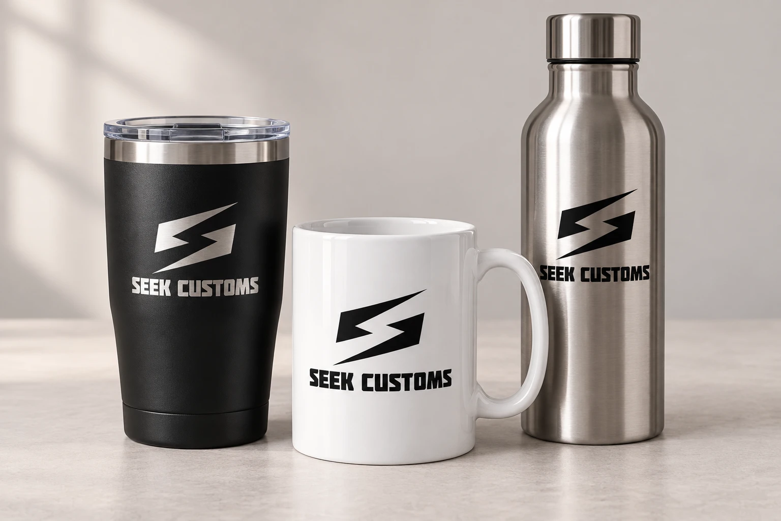 Seek Customs branded tumbler, mug, and water bottle
